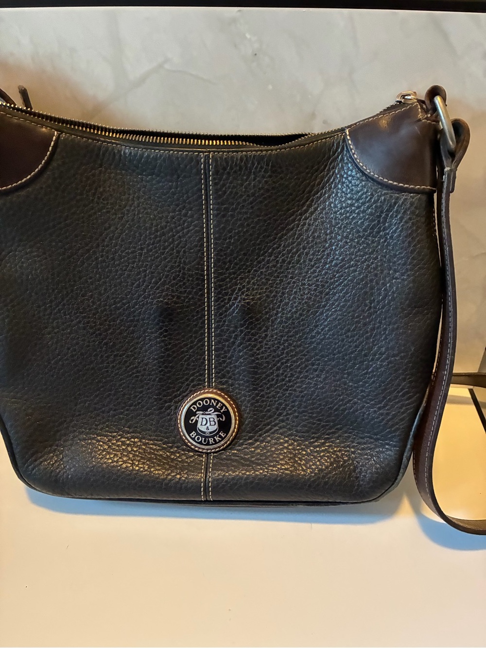 Dooney & Bourke Black Pebbled Leather Shoulder Bag with Brown Trim